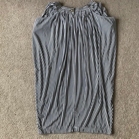 Styled! Includes: midriff top, skirt, necklace. - Picture 3 of 4